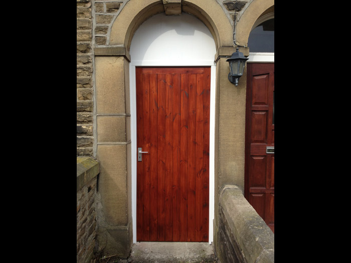 Hardwood frame and softwood T&G door