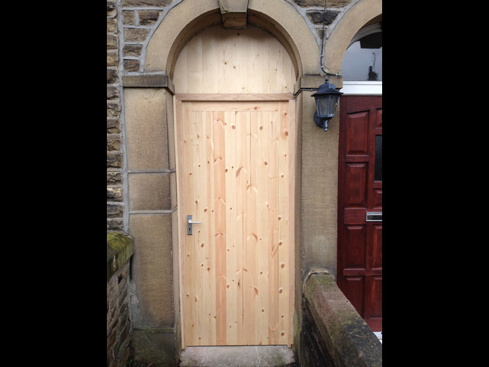 Hardwood frame and softwood T&G door